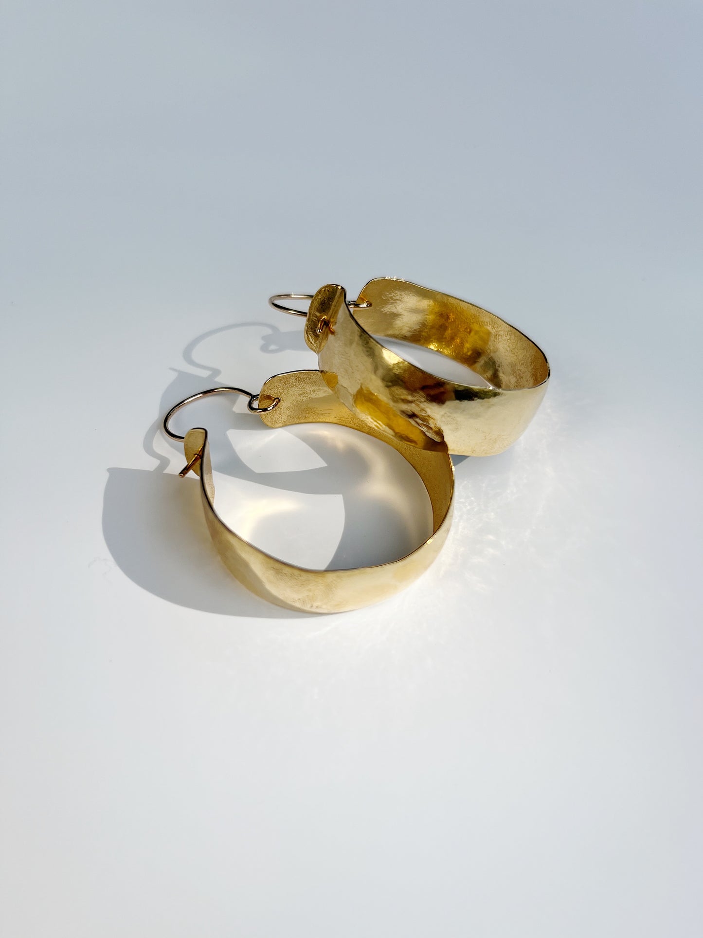 As hoop earrings
