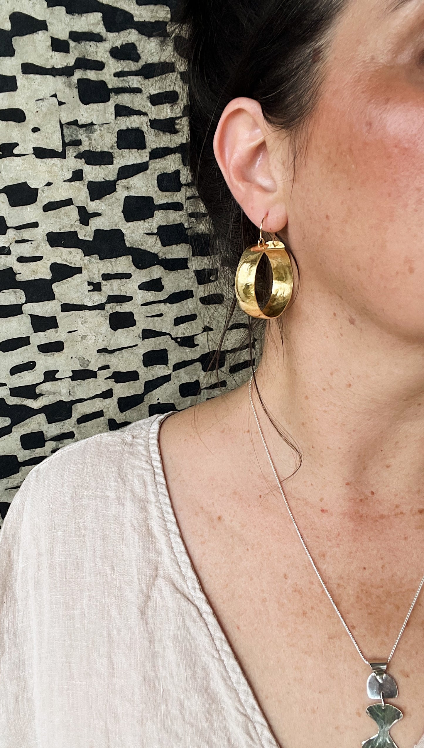 As hoop earrings