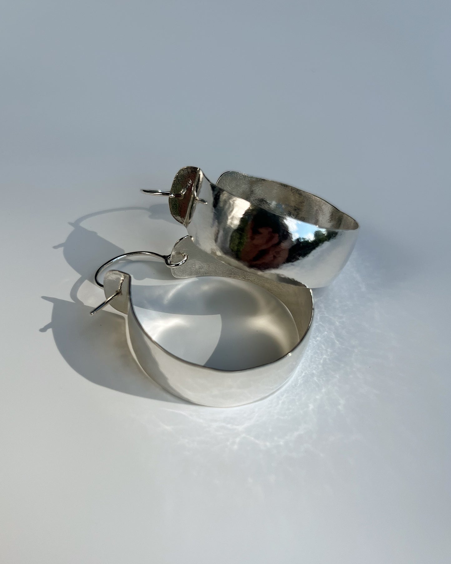 As hoop earrings