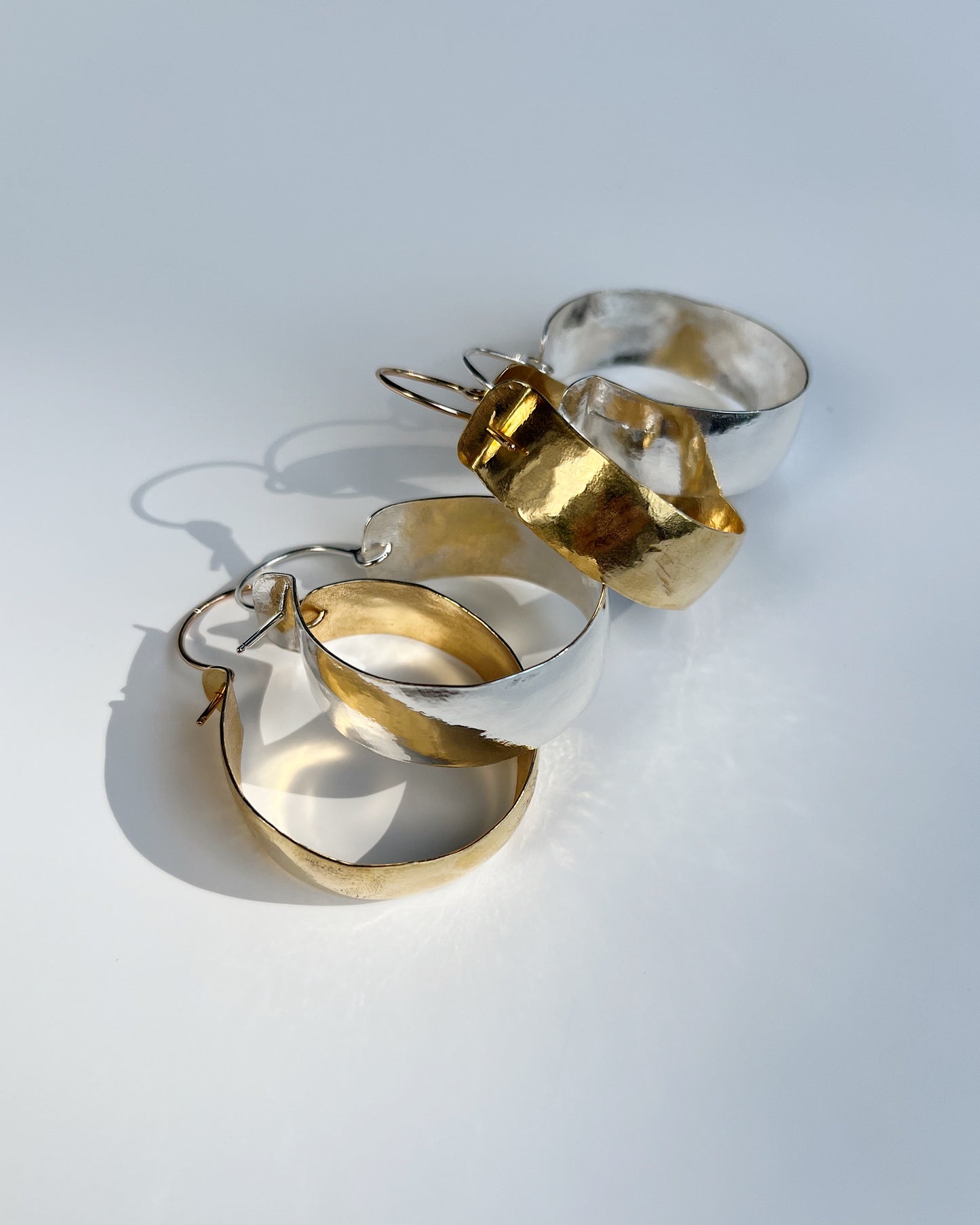 As hoop earrings